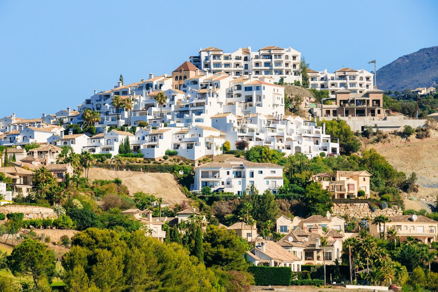 White lanes and restaurants in the village of Benahavís