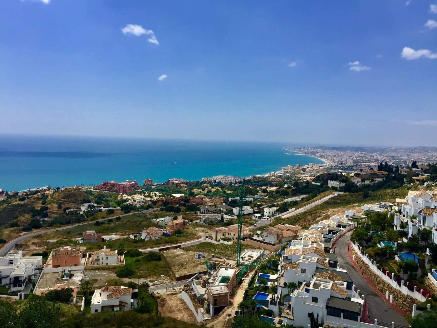 Beach and promenade of Benalmádena Costa near Puerto Marina