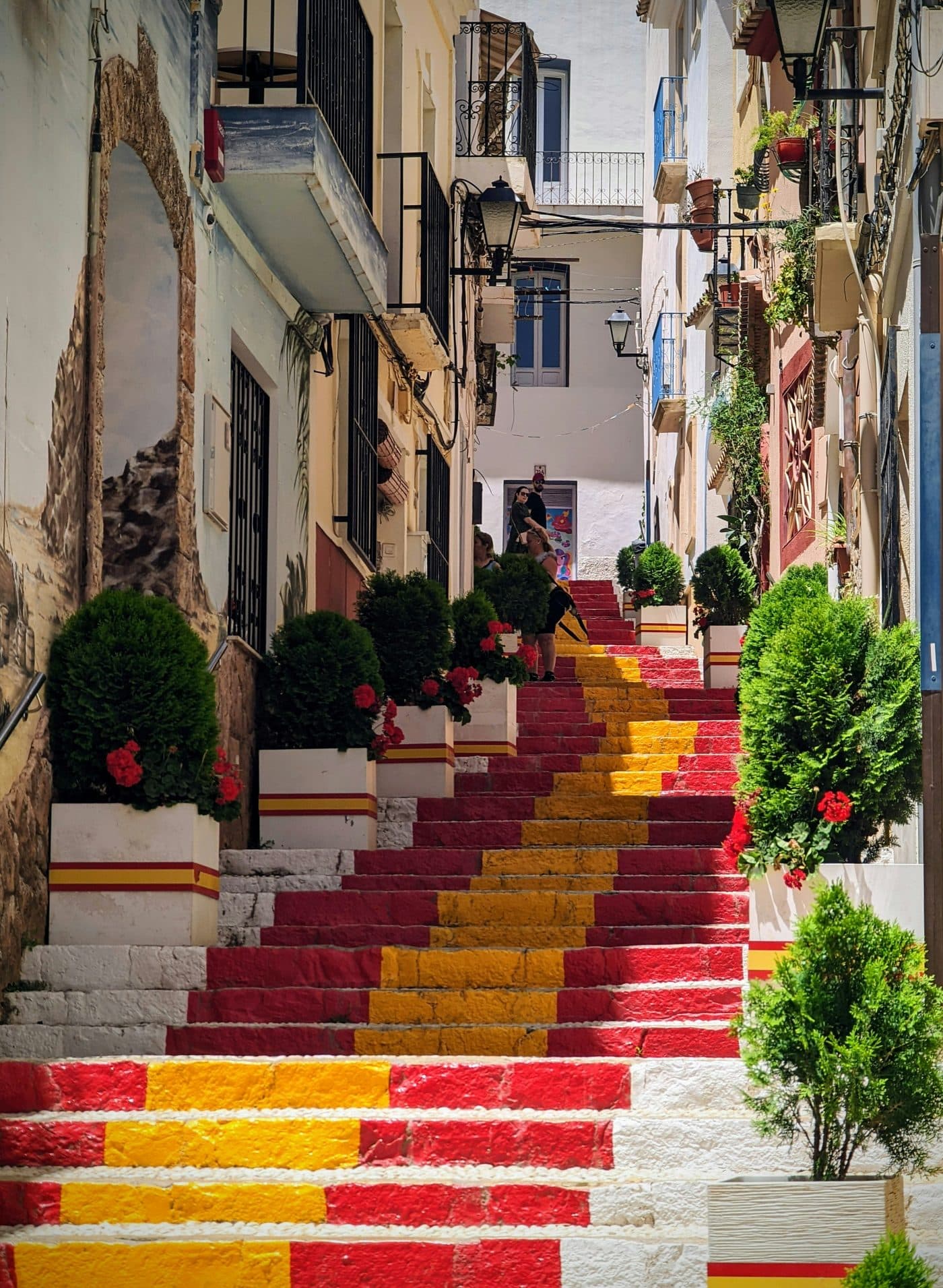 Street in the old town of Calpe with a mural